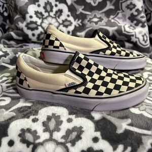 Vans Black and Cream Checkered Slip-On Sneakers